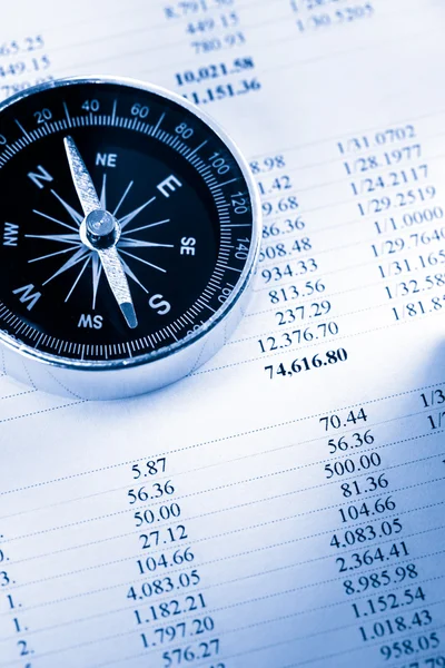 Operating budget and black compass — Stock Photo, Image