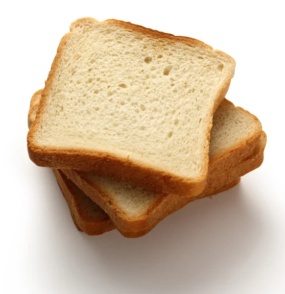 Rebanadas de pan sobre fondo blanco —  Fotos de Stock