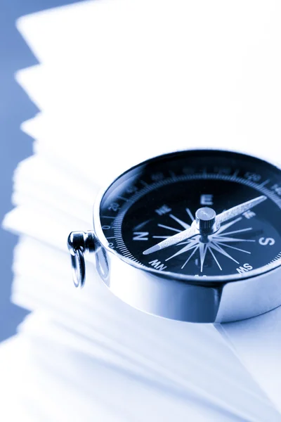 Stack of white cards and compass — Stock Photo, Image