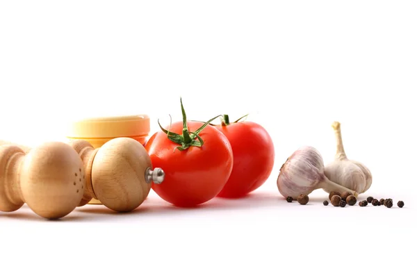 Élelmiszer-összetevők, a paradicsom és a fokhagyma — Stock Fotó