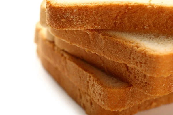 Rebanadas de pan sobre fondo blanco — Foto de Stock