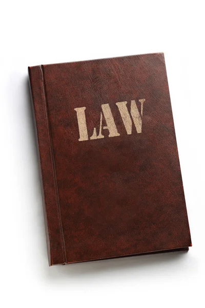 Law book on white background — Stockfoto