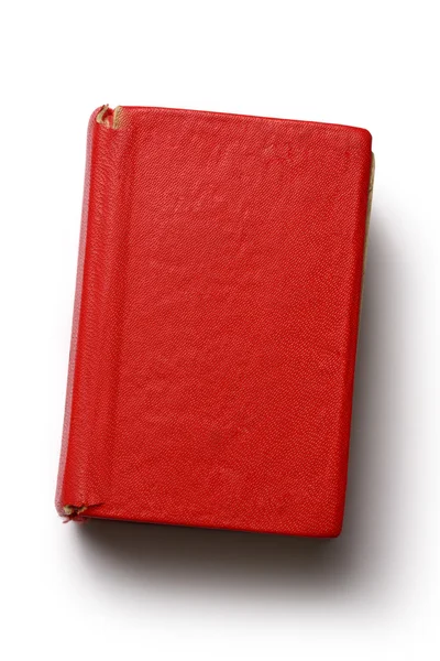 Old red book on white background — Stock Photo, Image