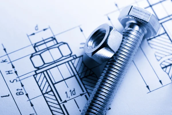 Drafting and screw bolt with nut — Stock Photo, Image