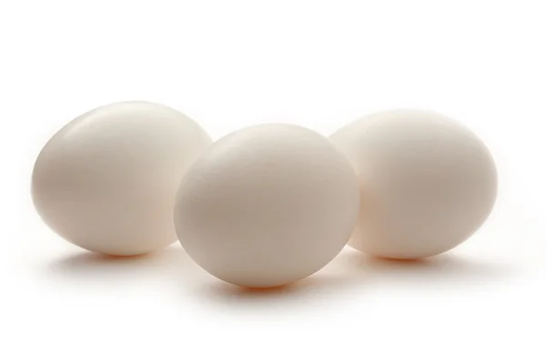 Eggs on the white background — Stock Photo, Image