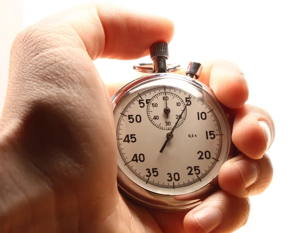 Male hand holding stopwatch — Stock Photo, Image