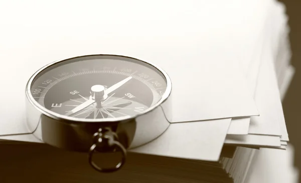 Stack of white cards and compass — Stock Photo, Image