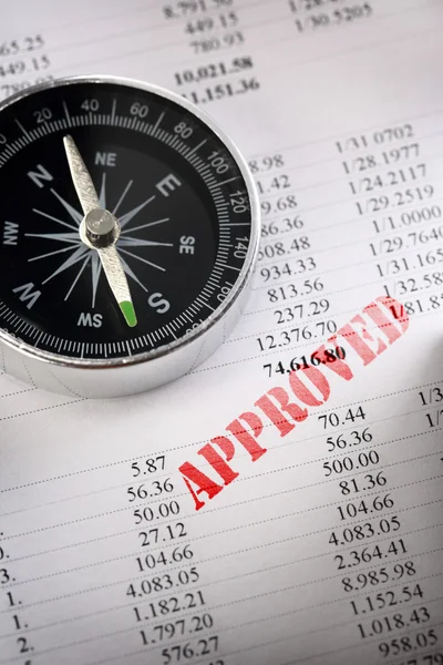 Operating budget and black compass — Stock Photo, Image