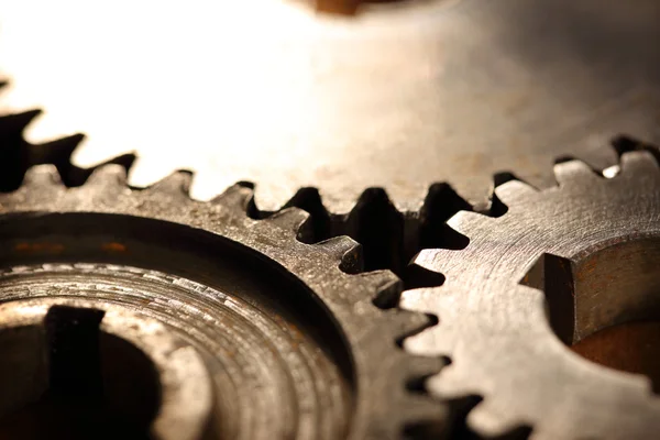 Three steel cogwheels in connection — Stock Photo, Image