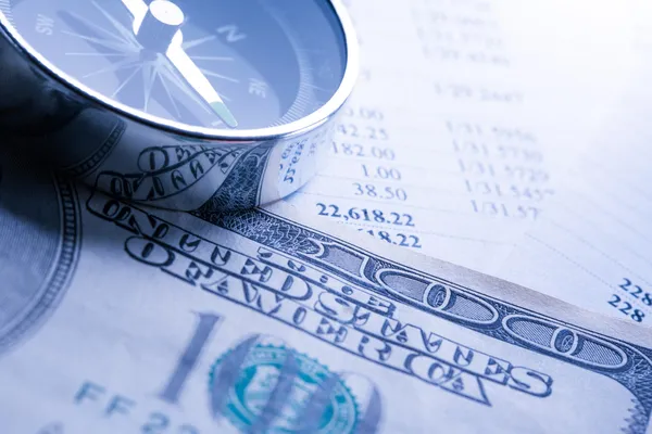 Budget, dollars and black compass — Stock Photo, Image