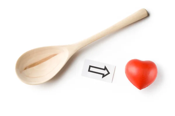 Spoon and heart on white — Stock Photo, Image