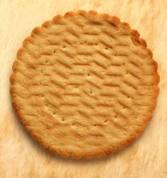 Round biscuit on stained background — Stockfoto