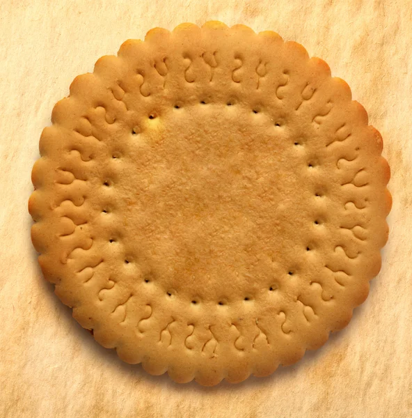 Round biscuit on stained background — Stockfoto