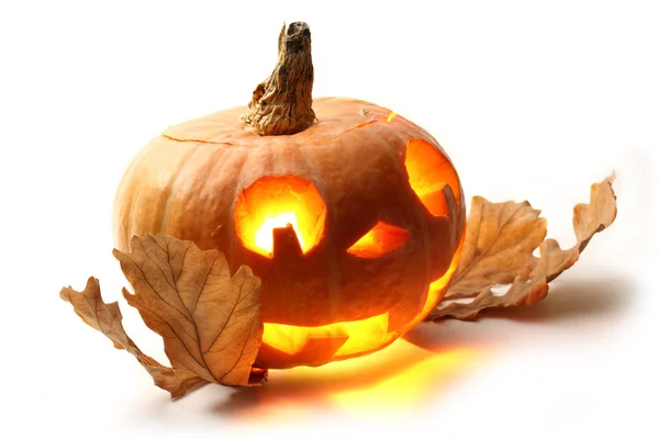 Funny halloween pumpkin with oak leaves — Stock Photo, Image