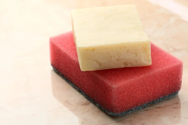 Bar of soap and sponge — Stock Photo, Image