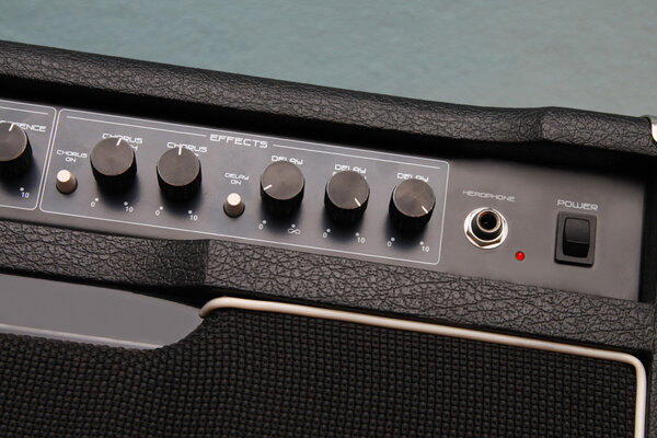 Guitar amplifier on white background