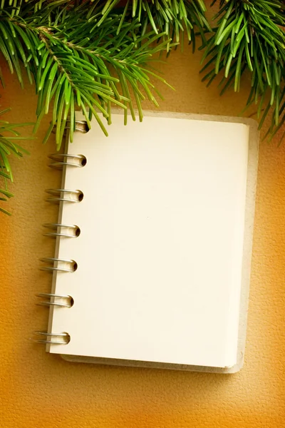 Christmas background with notepad — Stock Photo, Image