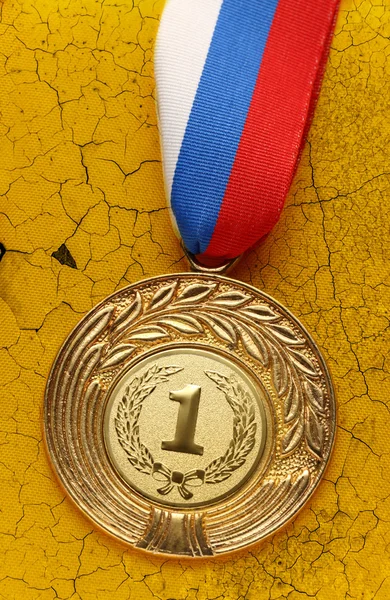 Medal on old wall — Stock Photo, Image