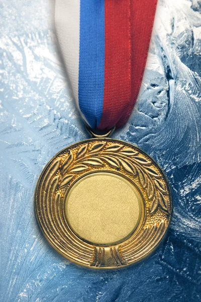 Medal on ice — Stock Photo, Image