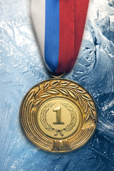 Medal on ice — Stock Photo, Image