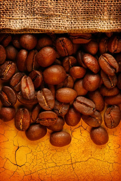 Coffee beans with sack — Stock Photo, Image