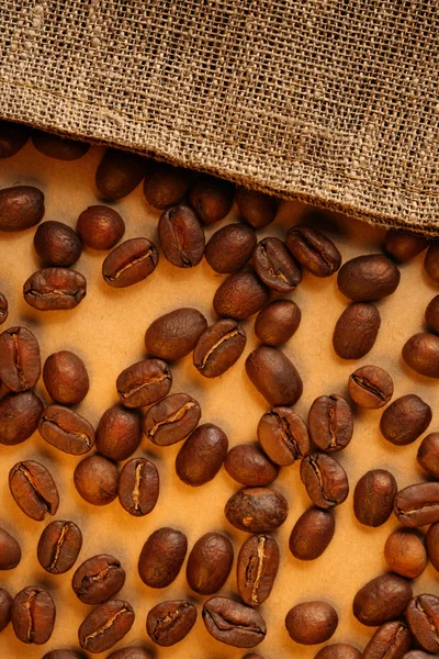 Coffee beans with sack — Stock Photo, Image