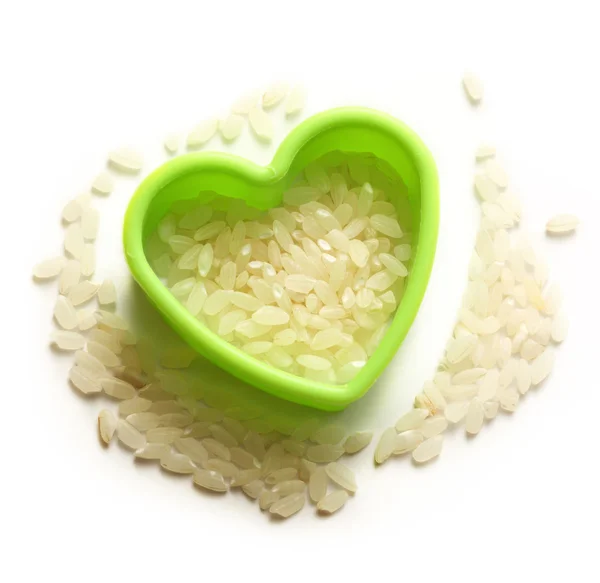 Hromada rýže a srdce — Stock fotografie