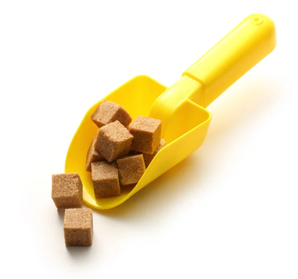 Zuckerwürfel mit Löffel — Stockfoto
