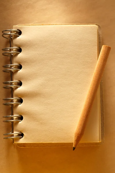 Notepad with wooden pencil — Stock Photo, Image