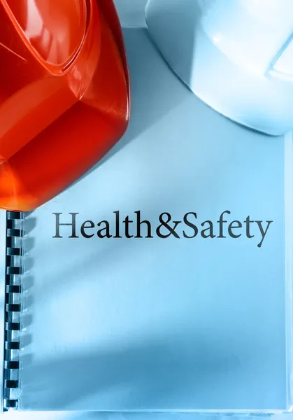 Health and safety with helmets — Stock Photo, Image