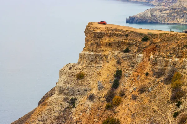 Red Car High Cliff Royalty Free Stock Photos