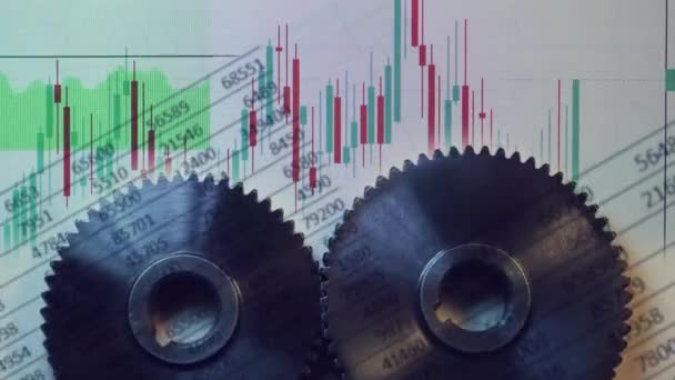 Concepto de negocio con ruedas dentadas y gráficos de stock — Vídeos de Stock