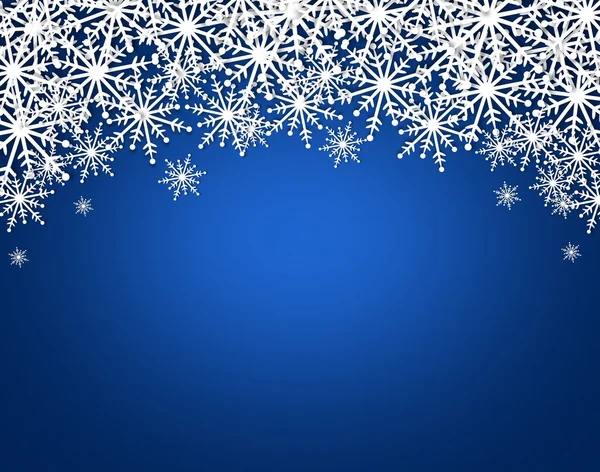 Snöflingor på blå bakgrund — Stockfoto