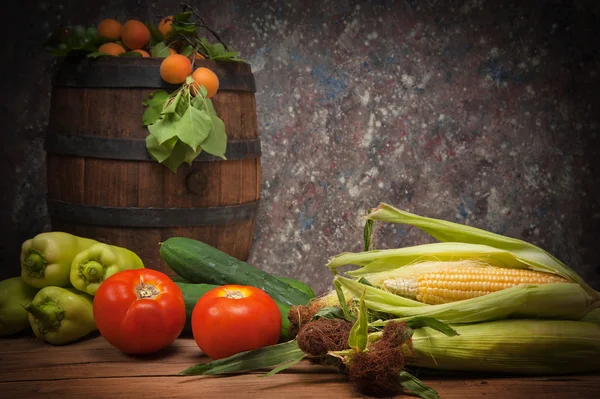 Vegetables and fruit with a wooden barrel — Stock Photo, Image