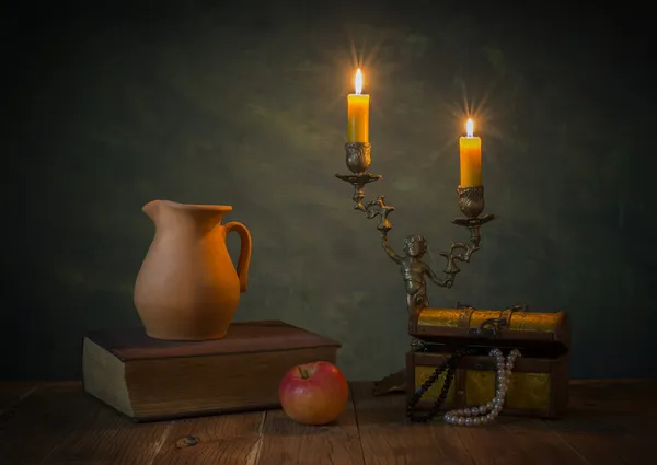 Lighted candles and books — Stock Photo, Image