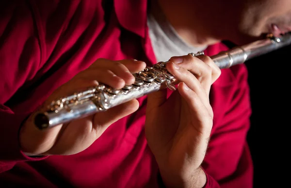 Man playing the flute — Stock Photo, Image