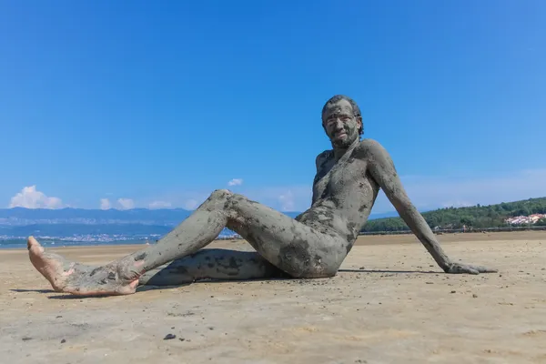 Man smeared with healing mud — Stock Photo, Image