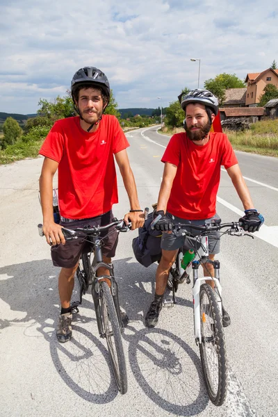 Two men on bicycles. — Stock Photo, Image