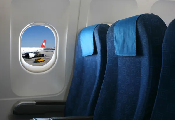 Sedile e finestrino dell'aereo — Foto Stock