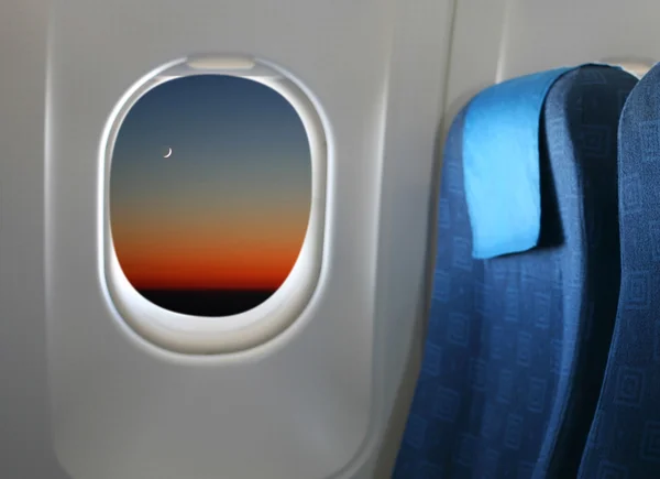 Airplane seat and window — Stock Photo, Image