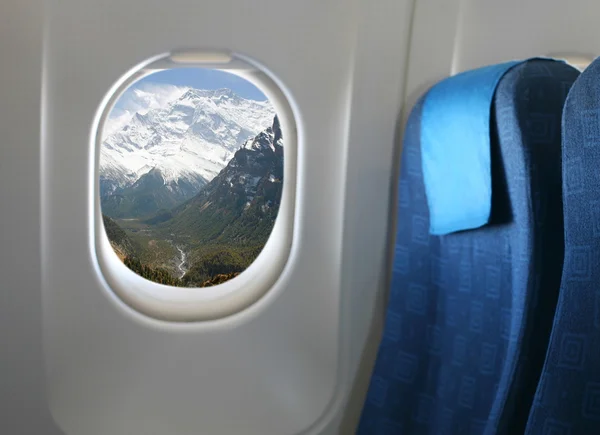 Asiento y ventana del avión —  Fotos de Stock