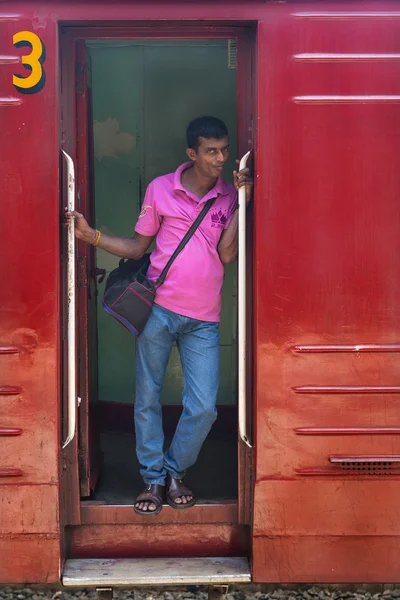 Local man standing at wagon entrance. — Stock Photo, Image
