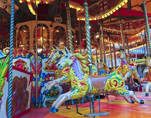 Um tiro de cavalos em um carrossel — Fotografia de Stock