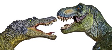 un spinosaurus se enfrenta con un tiranosaurio rex 