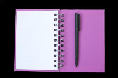 Açık mor defter kalem ile