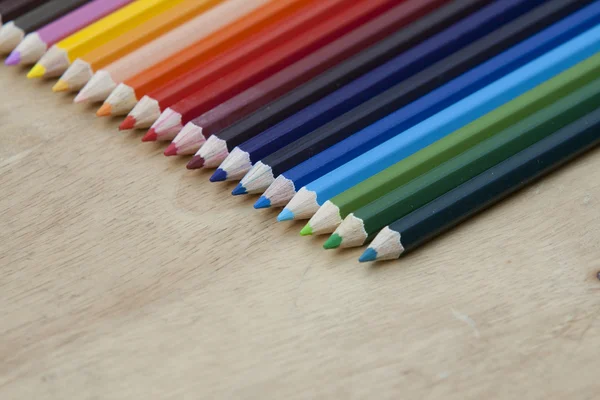 A lot of wooden pencils on wood — Stock Photo, Image