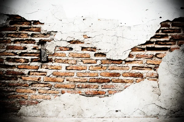 Parede de tijolo velho com rachado — Fotografia de Stock