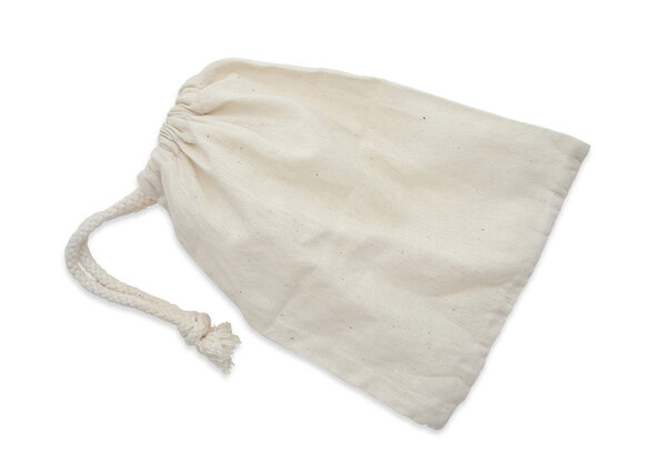Brown fabric bag on white isolated background.