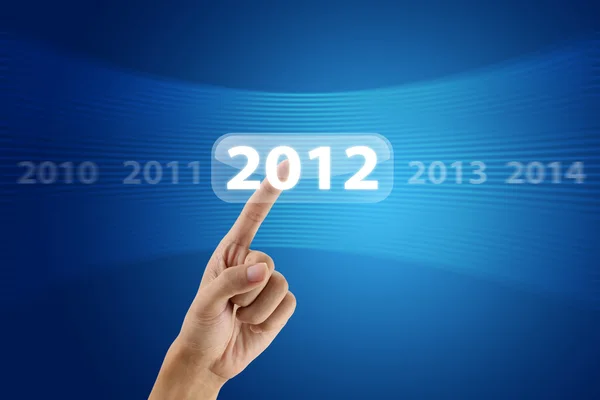 Hand pushing 2012 — Stock Photo, Image