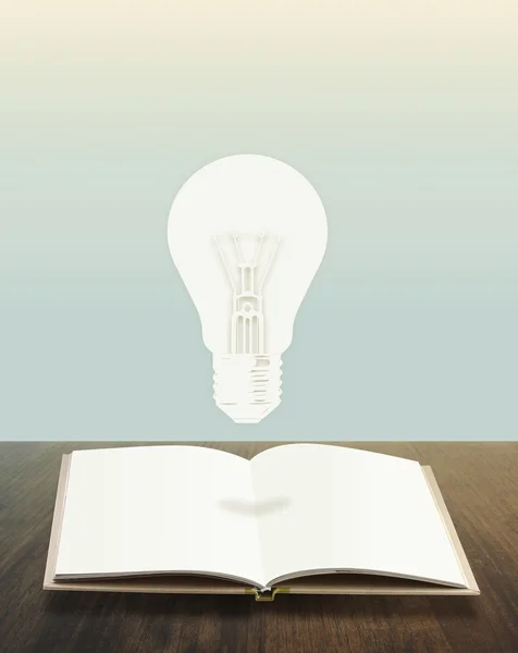 Glödlampor bok begreppsmässig stil — Stockfoto